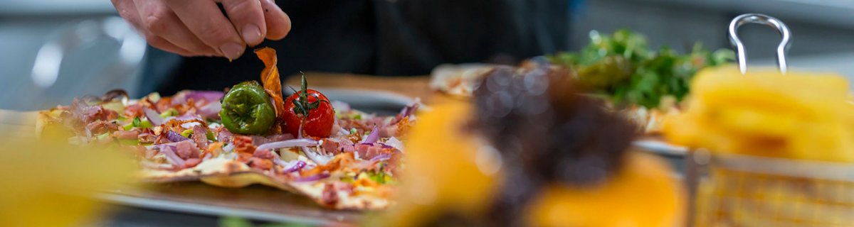 Detailaufnahme Flammkuchen. Detailaufnahme Flammkuchen.
