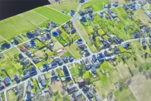 Globale Ansicht von Straßenzügen einer Ortschaft.