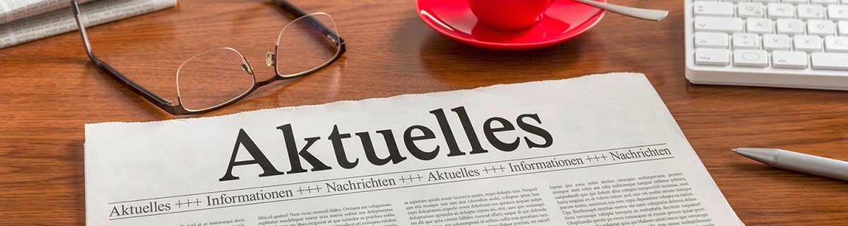 Zeitung auf Schreibtisch - Aktuelles